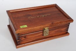 A vintage wooden Humidor with notation to the top Cave a Cigares,