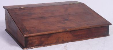 A 19th century country pine table top clerks writing slope box with hinged top and open storage