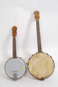 A Dallas Model George Formby Banjolele or Banjo - ukulele together with another banjo ( see