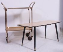 A vintage 1950's formica and brass effect tubular butlers trolley together with a formica coffee