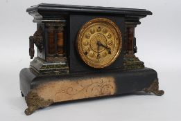 A Victorian faux slate and marble mantel