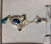 A white metal 925 silver and enamel art