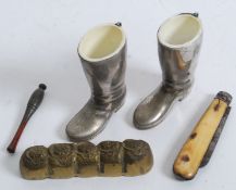 A dealers lot to include white metal spi