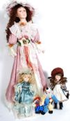 A 3ft tall ceramic doll, along with two