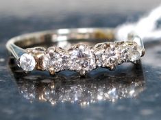 An 18ct gold and platinum  diamond 5 sto