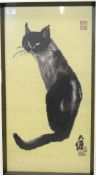 An Oriental tapestry work of a black cat