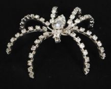 A decorative 20th century diamonte spider brooch of large form with pin back.