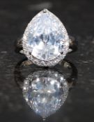 A ladies 925 silver cz stone dress ring having wonder pear cut stone to centre. 7.4g weight. Size P.