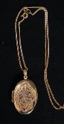 A 9ct gold hallmarked locket pendant with celtic motif on chain. Weight 5.