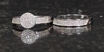 A ladies silver and cz stone inset dress ring with roundel head together with a matching half