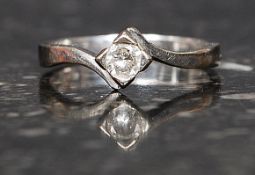 An 18ct white gold and diamond ladies solitaire ring. The claw mounted diamond approx 10pnts.