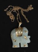 A ladies 9ct gold necklace set with a silver mounted jade elephant. Total weight 7.