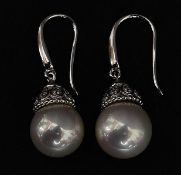 A pair of ladies 925 silver and cultured pearl earrings with hoops. Total weight 5.