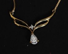A 9ct gold necklace with crystal drop on a flat snake link chain marked 375 Italy. Weight 2.2g.