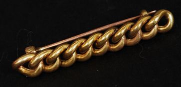 A 15ct bar brooch in the form of a rope twist / chain link. Weight 3.5g.