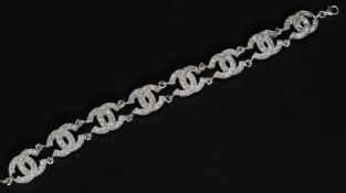 A silver chanel style bracelet, the bracelet with linked C construction. Total weight 22.