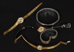 A vintage ladies yellow metal Timex wristwatch on leather strap together with an Avia incabloc