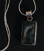 A ladies silver lozenge pendant with inset Labradorite stone set to a silver snake fine chain.