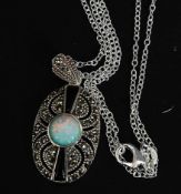 A silver ladies marcasite and opal pendant necklace.