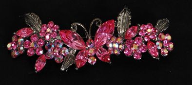 A stunning large Butler and Wilson brooch with floral and foliate detail with central butterfly