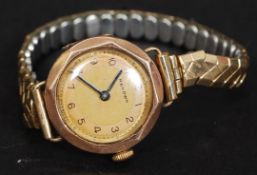 A 9ct gold ladies cocktail dress watch by Renown having 15 jewel movement set on rolled gold