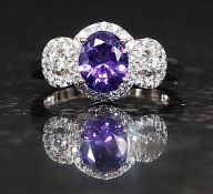 A ladies silver amethyst and cz stone dress ring.