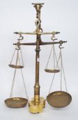 An unusual set of early 20th century brass weighing balance scales.