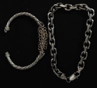 An 925 stamped silver metal curb braclet along with another ( tested ) silver bangle