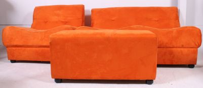 A contemporary retro modular 3 piece suite of serpentine form having stunning orange fabric frame.