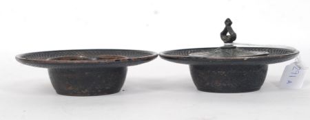 2 Chinese cast metal ebonised ashtrays,