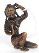 A late 19th early 20th century bronze Tibetan Chinese Buddha temple God figure.