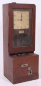 An Industrial mid century National Time Recorder Co Ltd clocking in clock, Roman numerals,
