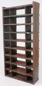 A  vintage industrial floor standing metal workshop pigeon hole cabinet.