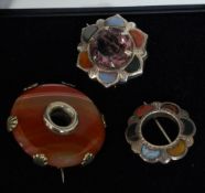 A collection of three antique Scottish silver and hardstone mounted bracelets.