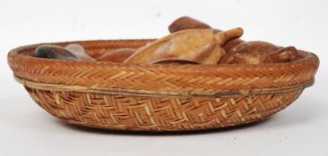 An interested late 19th / early 20th century woven African wicker basket,