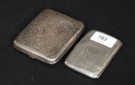 A silver ( sterling stamped ) chase decorated cigarette case with monogram to cartouche.