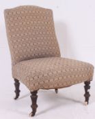 A late Victorian Nursing Chair.- armchair raised on turned legs with overstuffed seat and back rest.