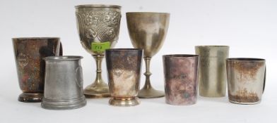 A collection of silver plated wares to include good Victorian goblet, measures,