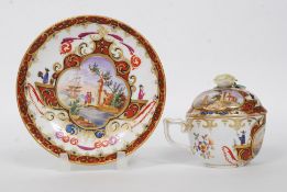 An early 19th century Meissen Chocolate Cabinet Lid Cup and Saucer.