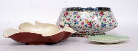 A Royal Winton Grimwades vase in a chintz pattern along with a Carlton Ware leaf dish and another