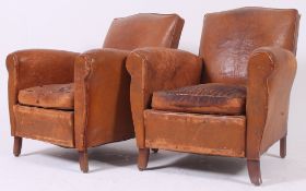 A pair of 1930's Art Deco French club armchairs.