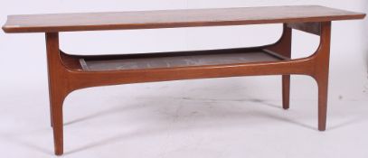 A 1970;s retro Danish influence teak wood surfboard having shaped supports with lower magazine tier.