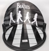 BEATLES WATCHES: An original rare Beatles Apple Corp commemorative watch display stand - depicting