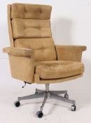 A 20th century retro style large directors office armchair in the manner of Herman Miller having