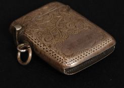 A silver hallmarked vesta having rococo chased decoration with monogram to the cartouche.