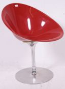 An original retro vintage Kartell Ero red plastic swivel chair - shaped plastic seat on a swivel