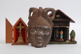 A vintage Swiss style chalet weather vane,