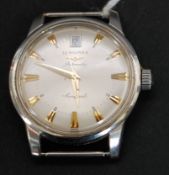A vintage gentlemans Longines Conquest Automatic stainless steel wristwatch.