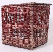 A large early 20th century Industrial - possibly military  vintage wicker woven laundry basket