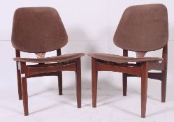 A pair of 1950's retro Danish influence bedroom nursing chairs with unusual design.